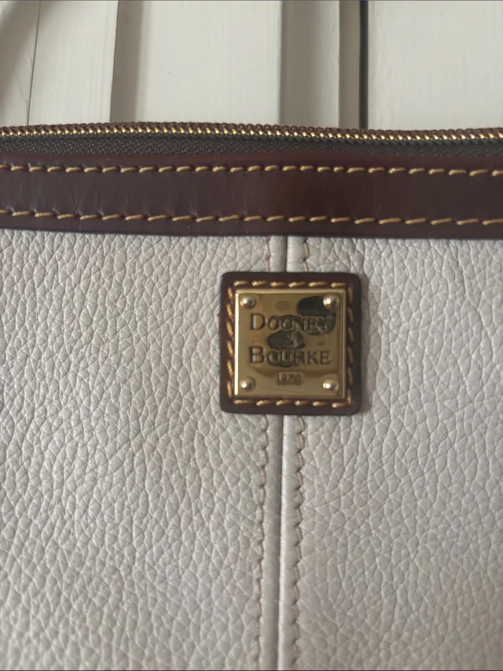 Dooney & Bourke Cream Shoulder Wristlet with Brown Trim